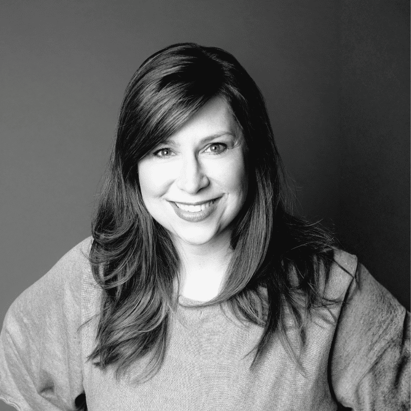 Portrait of Tracey D., a professional stylist at Maxine Salon, showcasing their expertise and style.