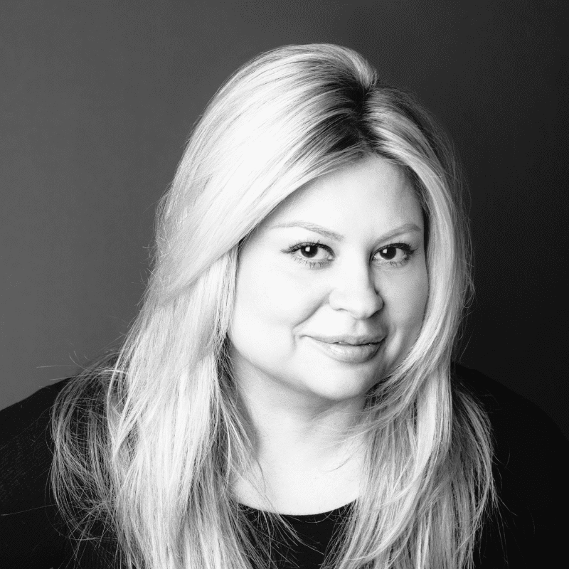 Portrait of Josie, a professional stylist at Maxine Salon, showcasing their expertise and style.