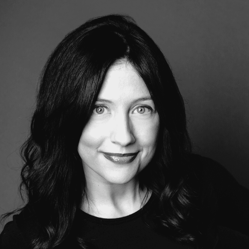 Portrait of Becca, a professional stylist at Maxine Salon, showcasing their expertise and style.